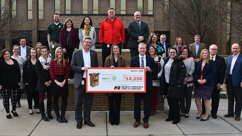 farm-bureau-employees-donate-14-350-to-greater-lansing-food-bank